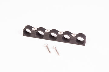 Stock photo of a black, 5-way Radium Hose Separator Clamp.