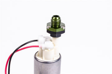 Stock photo of a green, metal Radium Pump Outlet adapter.