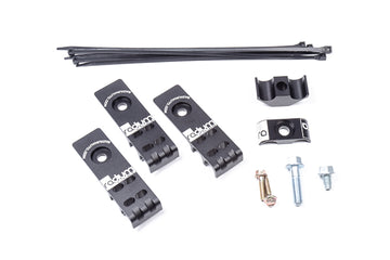 Stock photo of a black, metal Radium Fuel Line Retaining Kit for 2008 - 2021 Subaru.