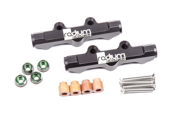 Stock photo of black, metal Radium Fuel Rails for top feed conversion on Subaru EJ engines.