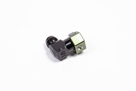 Stock photo of a black, metal, low-profile Radium 3/8In SAE Female to 6AN Male fitting with green accents.