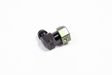 Stock photo of a black, metal, low-profile Radium 3/8In SAE Female to 6AN Male fitting with green accents.