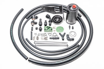 Stock photo of a black, metal Radium AOS-R Kit with green accents. 