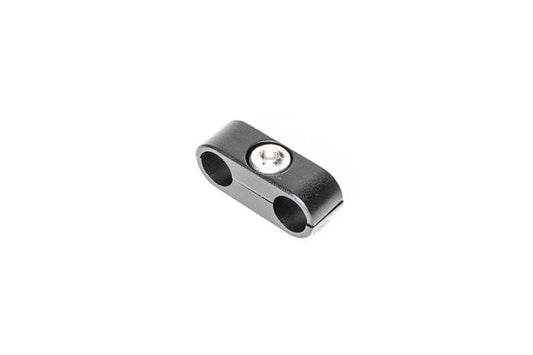 Stock photo of a black, metal, 2-way Radium Hose Separator Clamp.