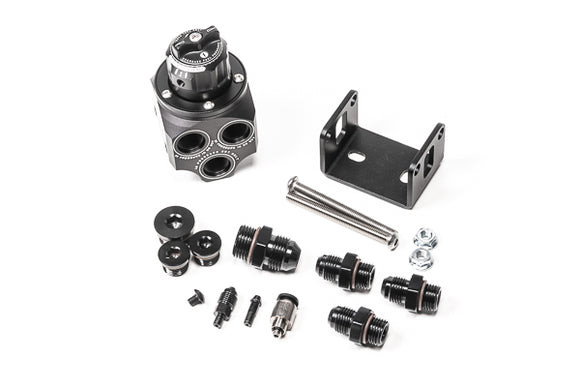 Stock photo of a black, metal Radium Multiport Regulator kit. 