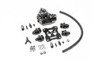 Stock photo of a black, metal Radium Fuel Pressure Regulator-Damper kit. 