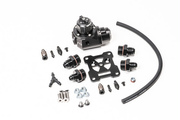 Stock photo of a black, metal Radium Fuel Pressure Regulator-Damper kit. 