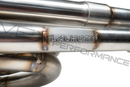 A close up shot of the metal Lachute logo badge that is welded to the pipe. 