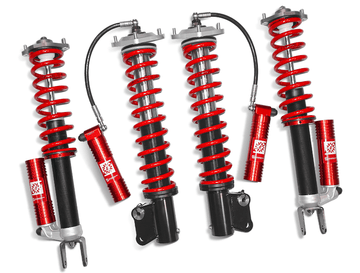 Samsonas stainless steel rally coilovers for Mistubish EVO 9 with red springs and external reservoirs.