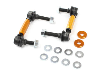 Whiteline rear adjustable sway bar links for Toyota GR Corolla models, with included washer set and yellow hardware accents. 