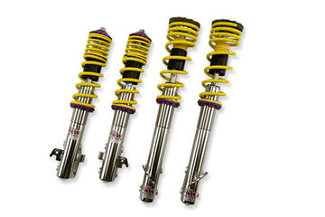 KW V1 high-performance stainless steel coilover suspension system for 2004-2007 Subaru WRX models with yellow springs and purple hardware.
