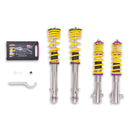 KW V1 high-performance stainless steel coilover suspension system for 2004 Subaru WRX STi models with yellow springs and purple hardware.
