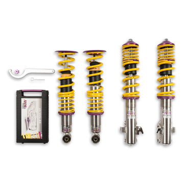 KW V1 high-performance stainless steel coilover suspension system for 2008-2014 Subaru WRX models with yellow springs and purple hardware.
