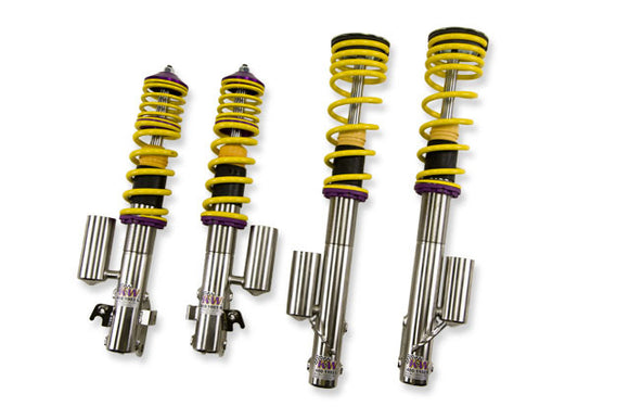 KW V3 high-performance stainless steel coilover suspension system for 2002-2003 Subaru WRX STi models with external piggyback reservoirs, yellow springs and purple hardware.
