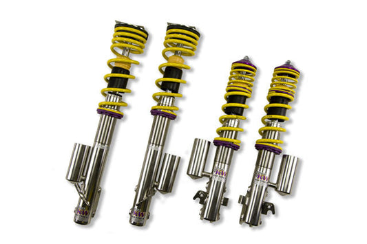 KW V3 high-performance stainless steel coilover suspension system for 2004-2007 Subaru WRX models with external piggyback reservoirs, yellow springs and purple hardware.
