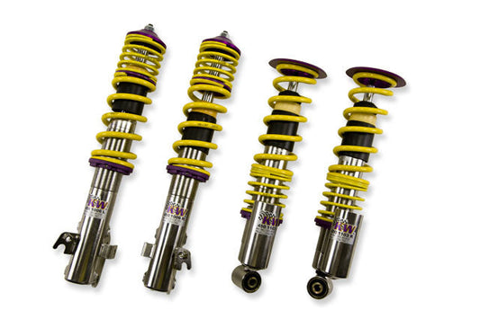 KW V3 high-performance stainless steel coilover suspension system for 2008-2014 Subaru WRX models with piggyback reservoirs, yellow springs and purple hardware.