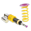 Rear damper with spring detached and purple rebound adjustment knob.
