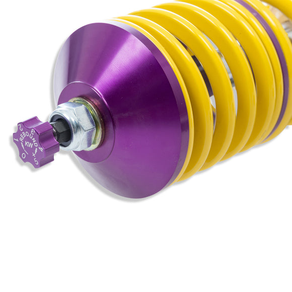 Close up shot of the purple rebound adjustment knob for the front coilover.